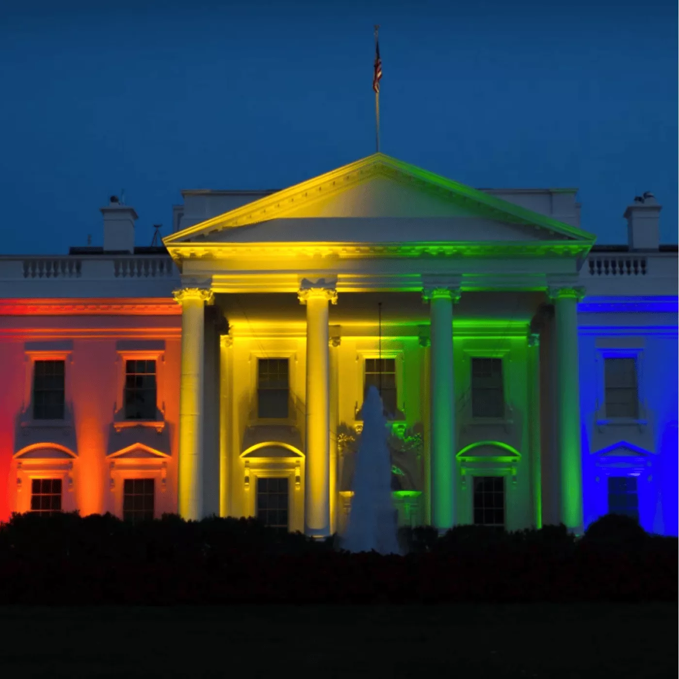 house lit with rainbow colors supporting Pride 365