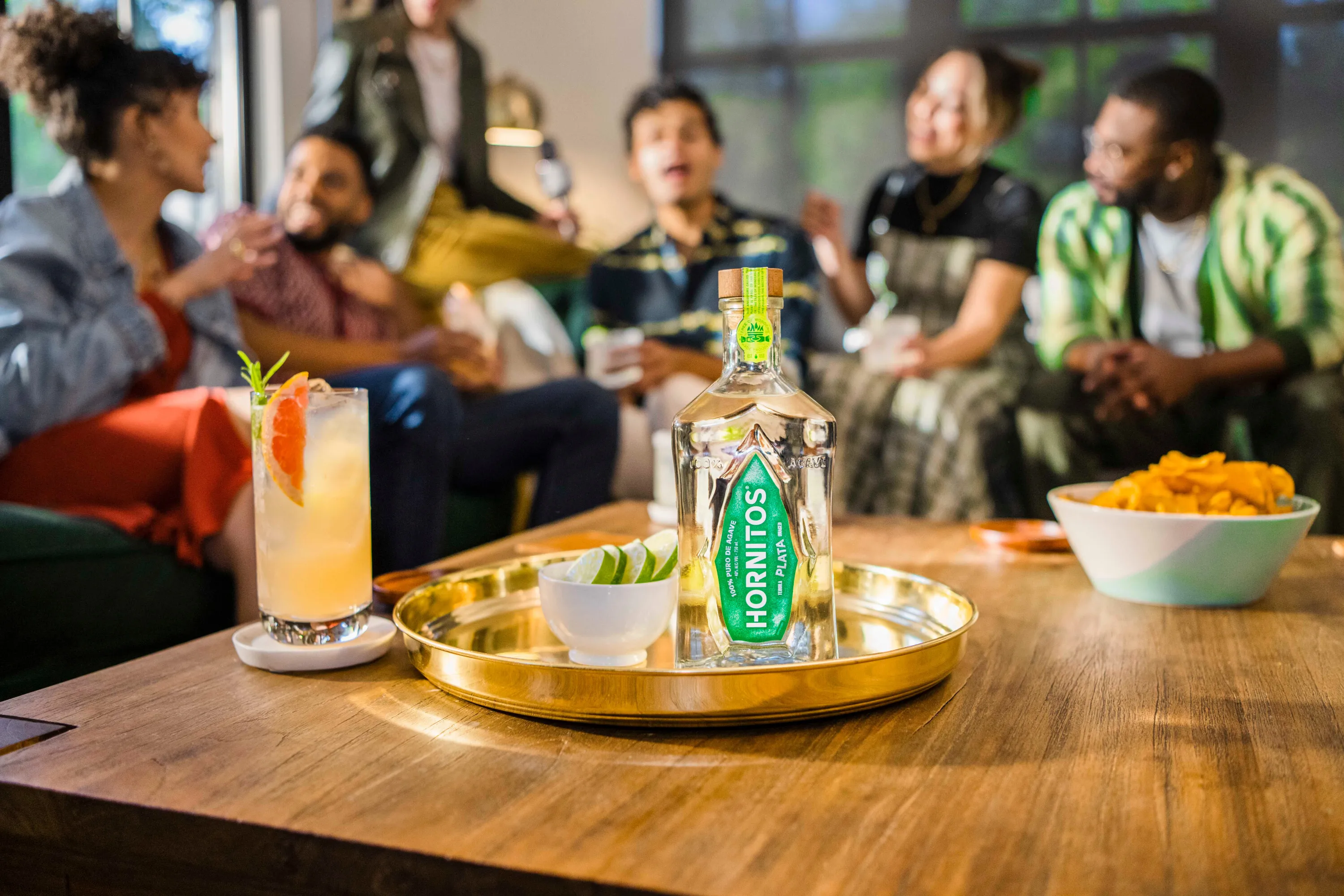 Friends enjoying with Plata whiskey